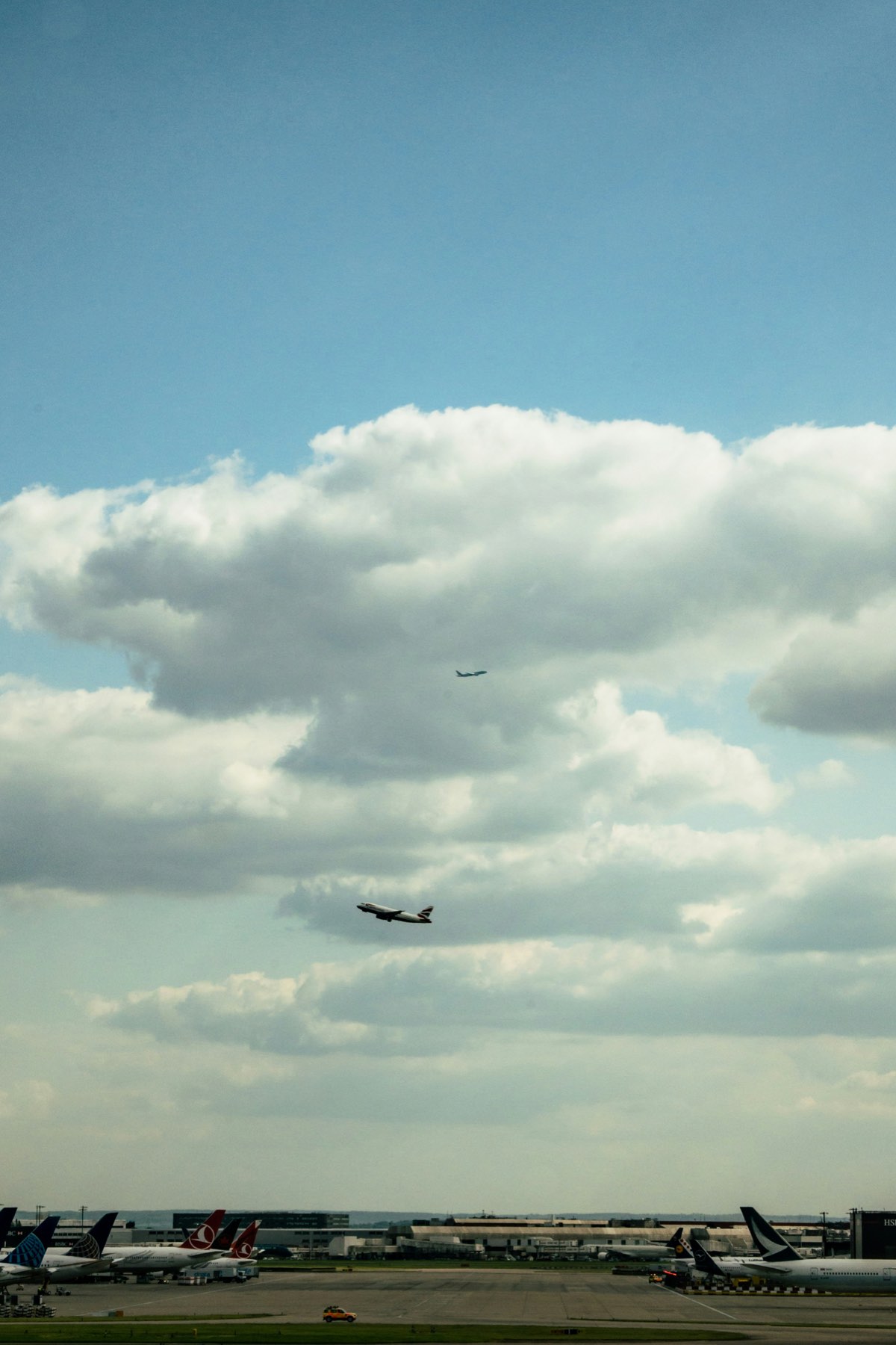 Heathrow tarmac with aircraft and terminal